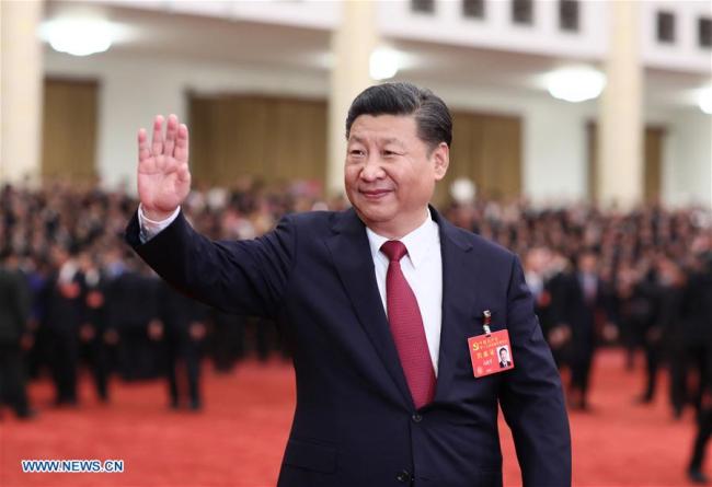  Xi Jinping, general secretary of the Communist Party of China (CPC) Central Committee, meet s with more than 2,700 delegates, specially invited delegates and non-voting participants of the 19th CPC National Congress in Beijing, on October 25, 2017. [Photo: Xinhua]