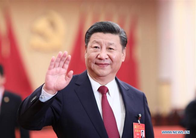  Xi Jinping, general secretary of the Communist Party of China (CPC) Central Committee, meet s with more than 2,700 delegates, specially invited delegates and non-voting participants of the 19th CPC National Congress in Beijing, on October 25, 2017. [Photo: Xinhua]